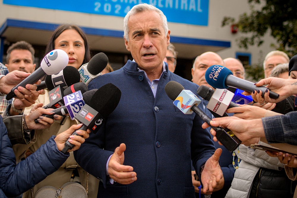 Calin Georgescu, running as an independent candidate for president, speaks to media after registering his bid in the country's presidential elections, in Bucharest, Romania, on October 1, 2024. (AP)