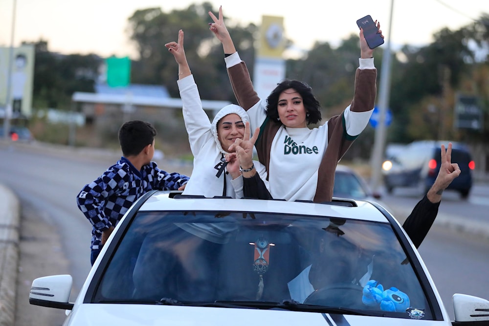  People celebrate after the ceasefire between 