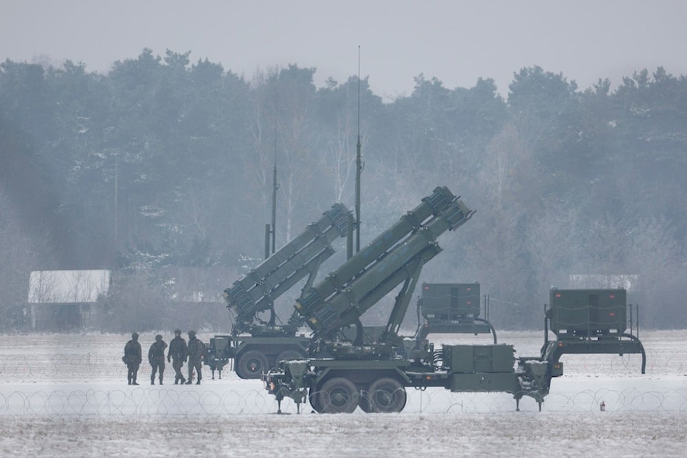 Patriot missile launchers acquired from the US last year are seen deployed in Warsaw, Poland, on February 6, 2023 (AP)