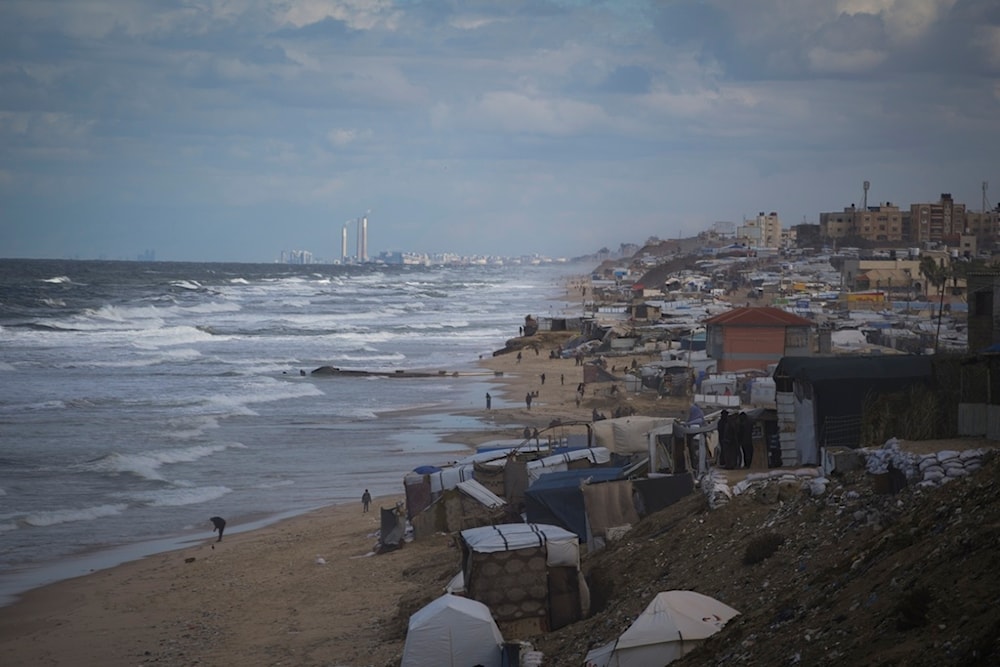 Tents occupied by displaced Palestinians are seen at the beach in Deir al-Balah, Gaza Strip, Tuesday, November 26, 2024 (AP)