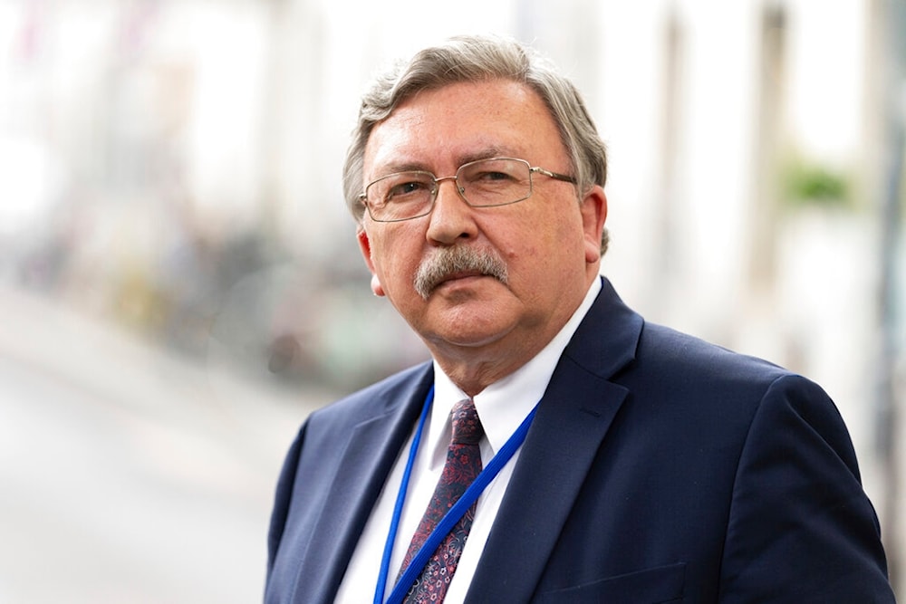 Russia's Governor to the International Atomic Energy Agency (IAEA), Mikhail Ulyanov, addresses the media near the 'Grand Hotel Vienna' where where closed-door nuclear talks take place in Vienna, Austria, Saturday, June 12, 2021. (AP)