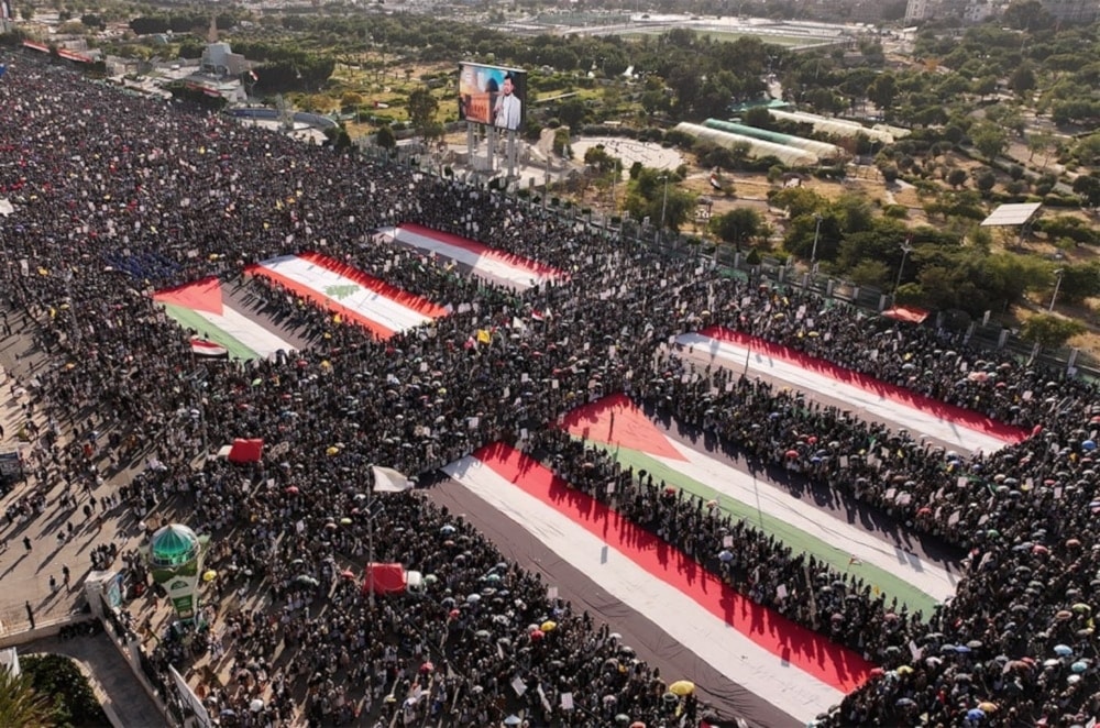  The flags of Yemen, Palestine, and Lebanon are shown amid a million-man demonstration in Sanaa on November 15, 2024 (Saba News Agency)