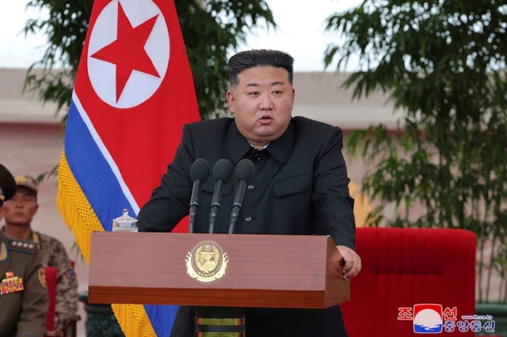 In this photo provided by the DPRK government, DPRK leader Kim Jong Un speaks as he visits an air force helicopter unit to praise the troops for helping rescue people from recent floods, at an undisclosed location in North Korea, Friday, Aug. 2, 2024. (AP)