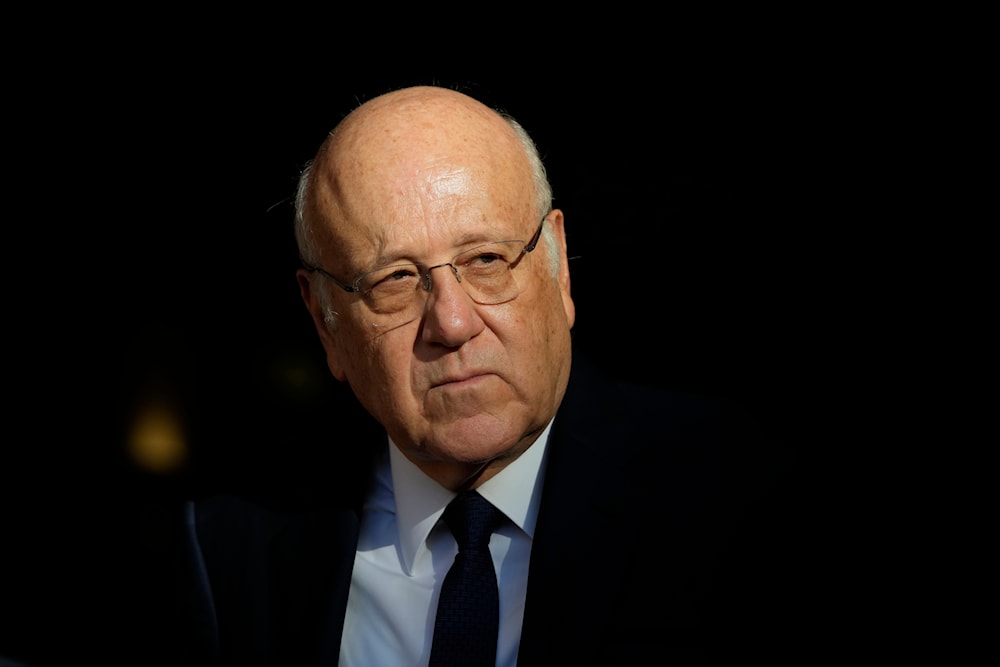 Lebanese caretaker Prime Minister Najib Mikati, looks on as he waits for the arrival of Italian Premier Giorgia Meloni, in Beirut, Lebanon, on October 18, 2024. (AP)