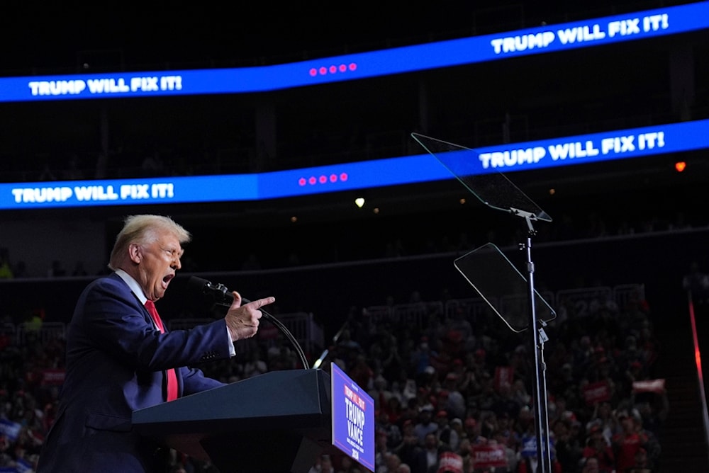 Republican presidential nominee former President Donald Trump speaks at a campaign rally at PPG Paints Arena, Monday, November 4, 2024, in Pittsburgh, Pennsylvania (AP)