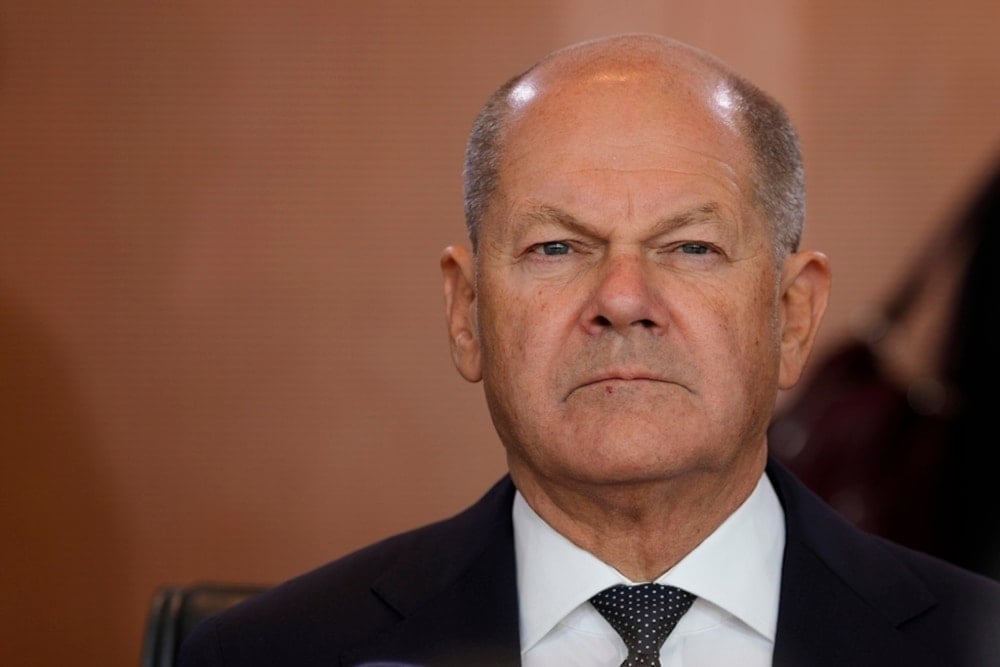  German Chancellor Olaf Scholz arrives for the cabinet meeting of the government at the chancellery in Berlin, Germany, Wednesday, Oct. 9, 2024. (AP)