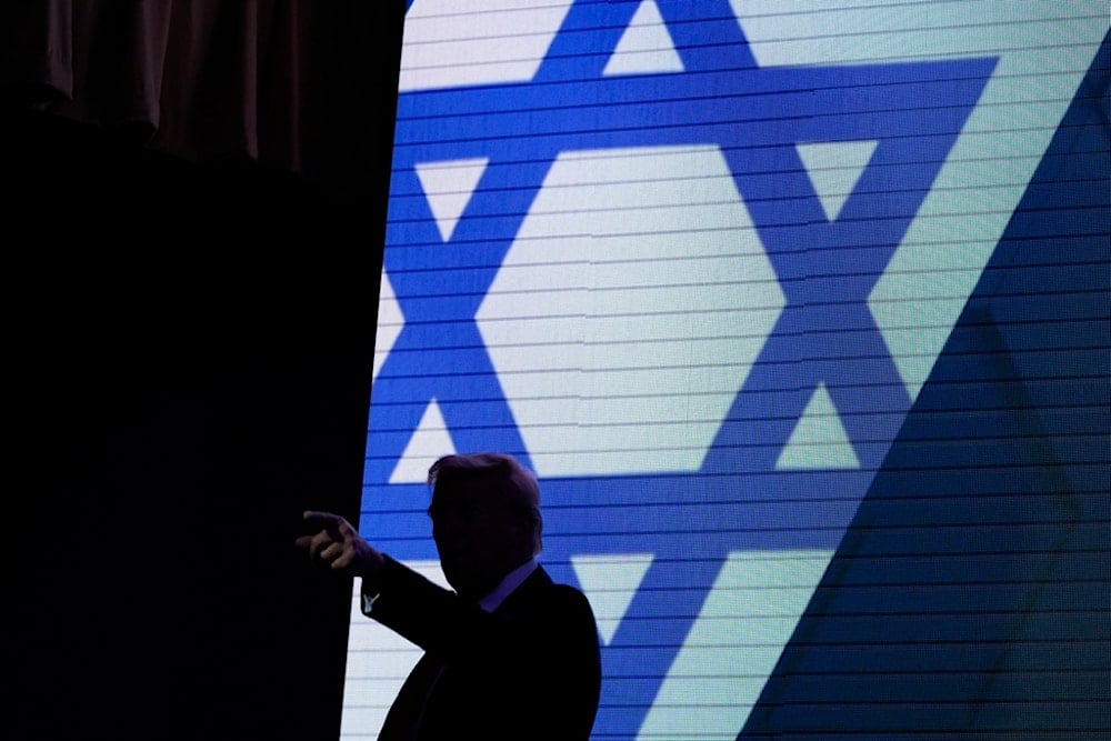 Republican presidential nominee former President Donald Trump acknowledges the crowd as he exits the stage after speaking at the Israeli American Council National Summit, Thursday, Sept. 19, 2024, in Washington. (AP)