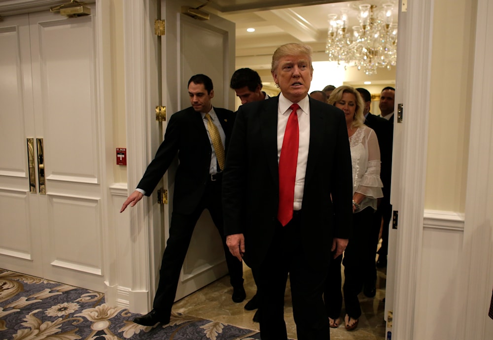 Republican presidential candidate Donald Trump arrives for a news conference at the Trump National Golf Club, on March 8, 2016, in Jupiter, Fla. (AP)