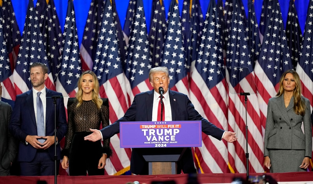 Republican presidential nominee former President Donald Trump speaks at an election night watch party, Nov. 6, 2024, in Florida, as Eric Trump, RNC co-chair Lara Trump and Melania Trump listen. (AP)