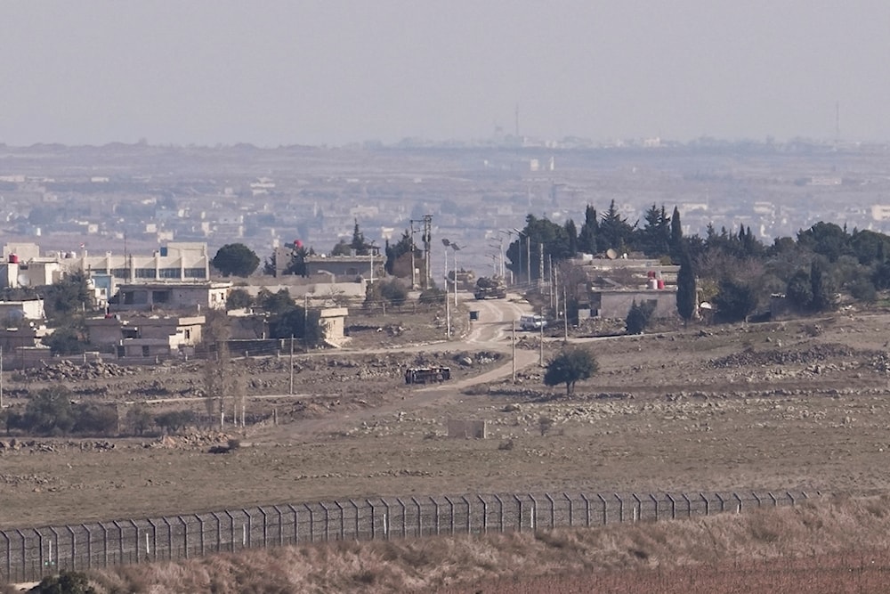 Israeli tanks maneuver in the buffer zone in the Quneitra crossing are viewed from the Israeli-annexed Golan Heights, Tuesday, Dec. 10, 2024. (AP)