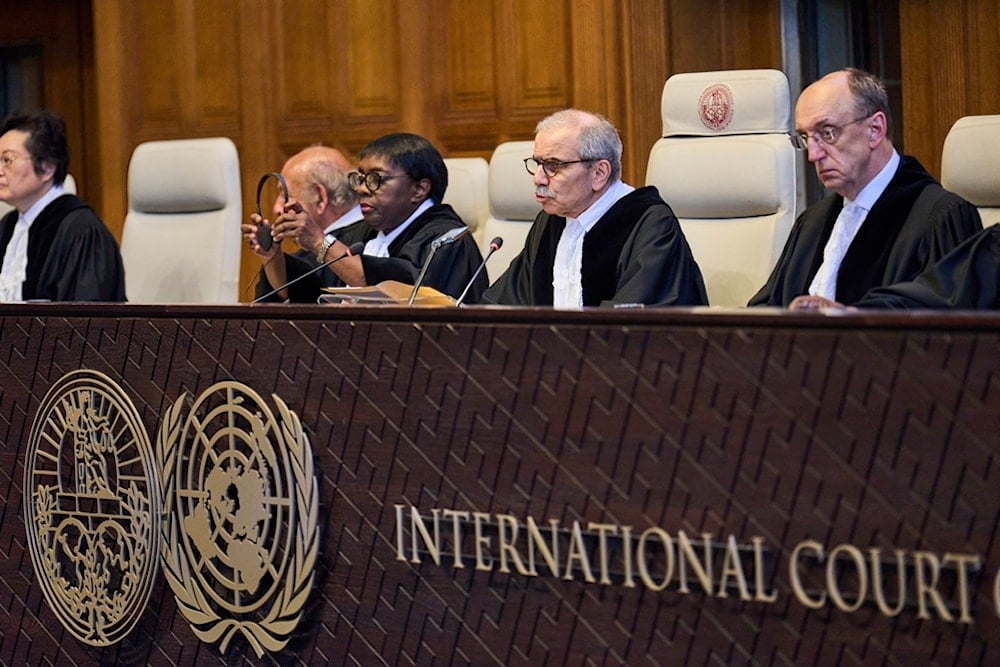 Presiding Judge Nawaf Salam reads the ruling in the International Court of Justice, or World Court, in The Hague, Netherlands, Friday, July 19, 2024 (AP)