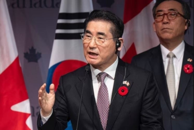 South Korea's Foreign Minsiter looks on as former South Korea's Defense Minister speaks during a news conference in Ontario, on November 1, 2024. (AP)