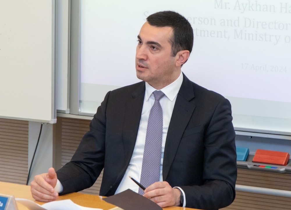 Aykhan Hajizada speaking with diplomats & academicians at  ADA University in April 2024. (X photo @Aykhanh)