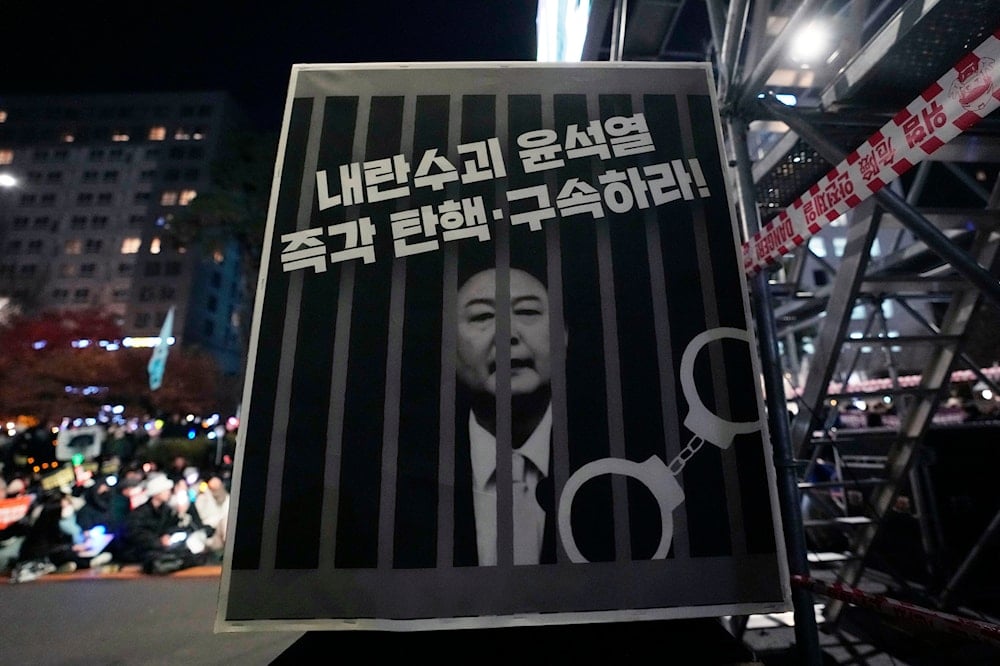 An image of depicting an imprisoned South Korean President Yoon Suk Yeol is displayed during a rally to demand his impeachment outside the National Assembly in Seoul, South Korea, on December 13, 2024. (AP)