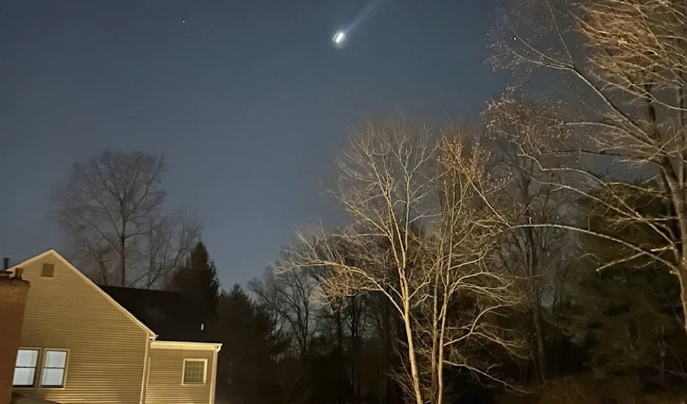 This photo provided by Brian Glenn shows what appears to be multiple drones flying over Bernardsville, N.J., on Thursday, Dec. 5, 2024. Brian Glenn/TMX/AP