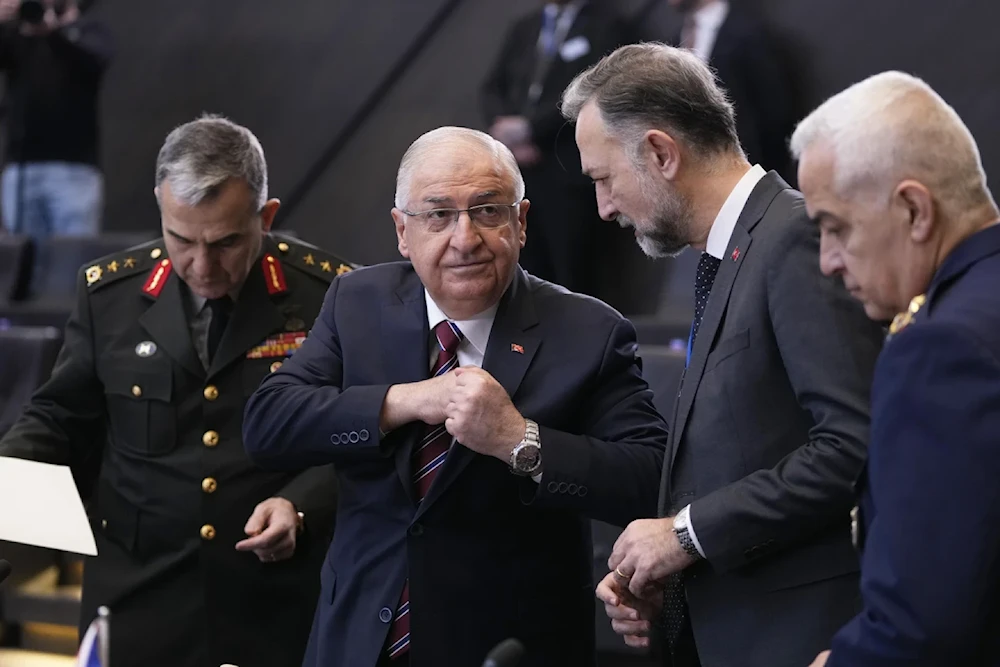 Turkish Defense Minister Yasar Guler, second left, speaks with members of his delegation during a meeting at Nato headquaters in Brussels, Thursday, Feburary 15,2024. (AP)