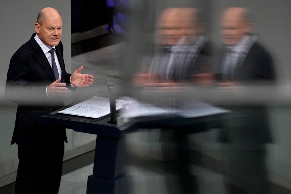 German Chancellor Olaf Scholz speaks during a plenary session at the German parliament Bundestag where he faces a vote of confidence, Berlin, Germany, Monday, Dec. 16, 2024. (AP)