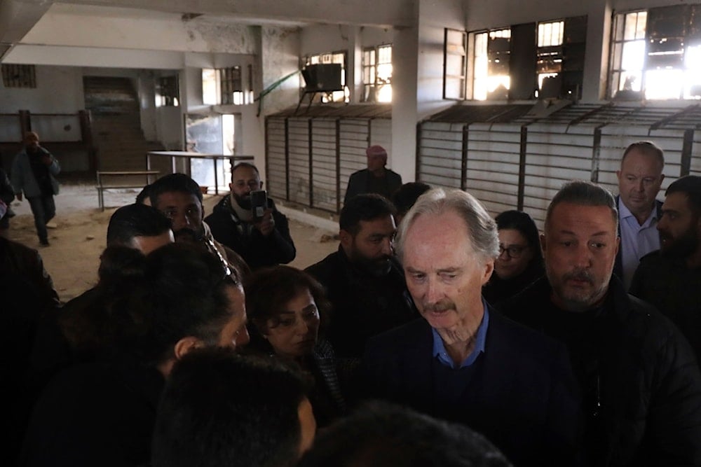 Geir Pedersen, the United Nations' special envoy to Syria, center, visits the infamous Saydnaya military prison, in Saydnaya north of Damascus, Syria, Monday, December 16, 2024 (AP)