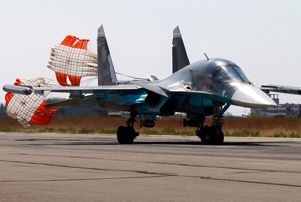 In this photo taken from Russian Defense Ministry official website on Tuesday, Oct. 6, 2015, a Russian SU-34 bomber lands at an airbase Hmeimim in Syria. (AP)