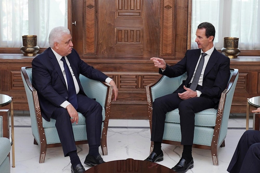 In this photo released by the Syrian official news agency SANA, Syrian President Bashar Assad, right, meets with Iraq's National Security Advisor Faleh al-Fayyad in Damascus, Syria, October 17, 2019. (AP)