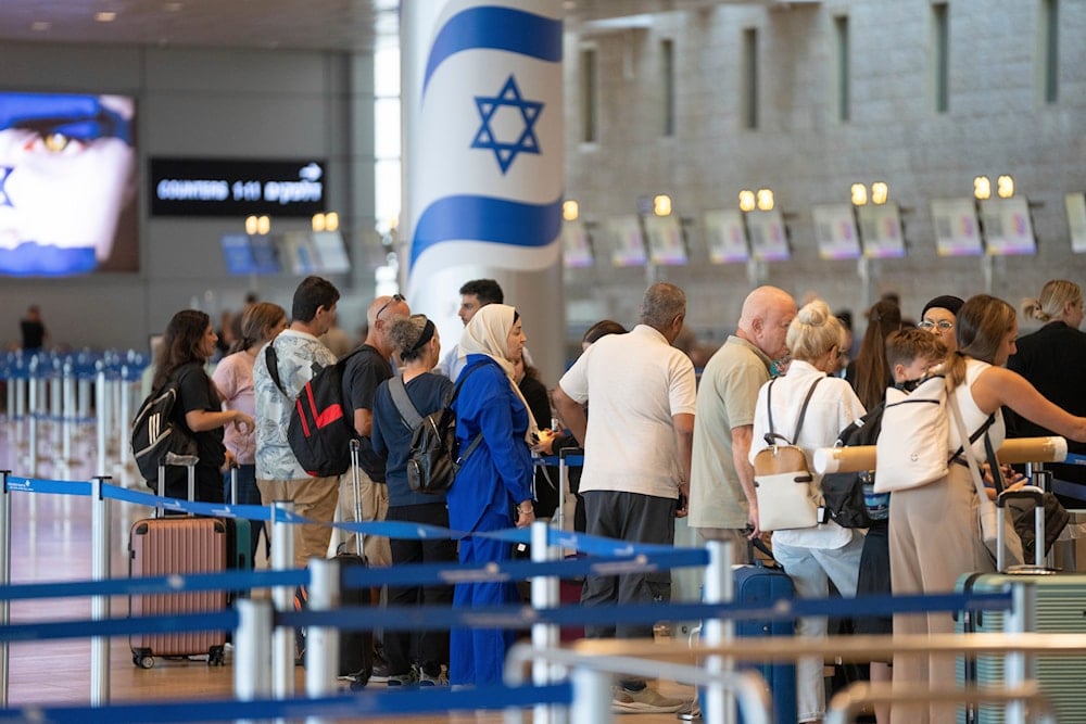 Travelers line up at Ben Gurion International Airport near Tel Aviv, 