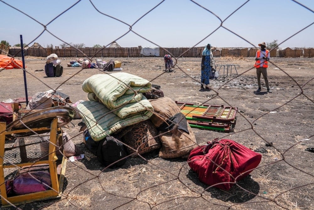 The belongings of people who crossed the border from Sudan sit in a yard at the Joda border crossing in South Sudan on Tuesday, May 16,2023. (AP)