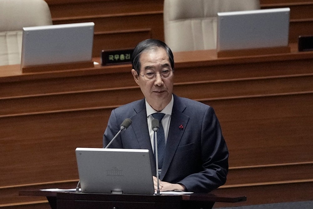 South Korean Prime Minister Han Duck-soo speaks during a plenary session held relating to the martial law declaration, at the National Assembly in Seoul, South Korea, on December 11, 2024. (AP)