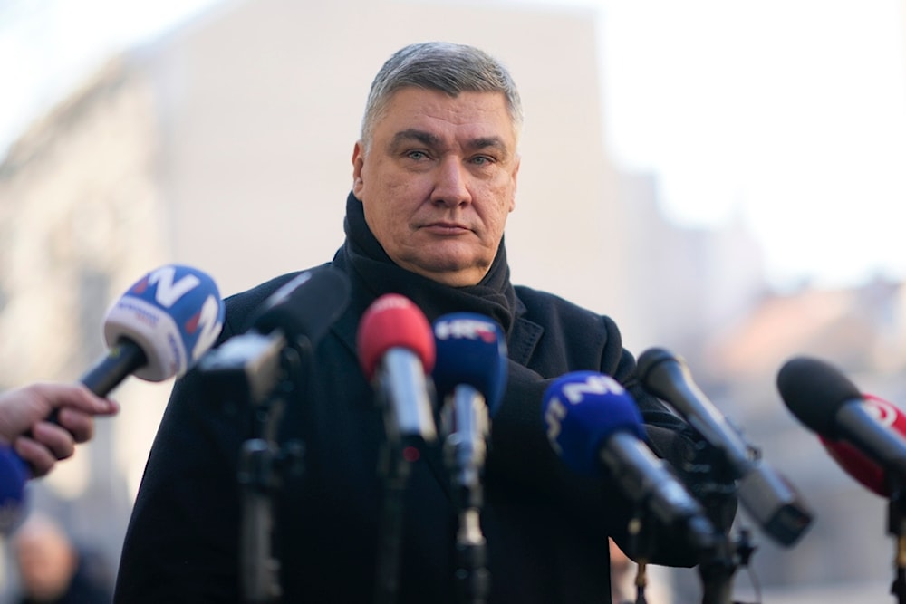 Croatia's President Zoran Milanovic speaks to the media after casting his ballot during presidential elections, at a polling station in Zagreb, Croatia, Sunday, Dec. 29, 2024. (AP)