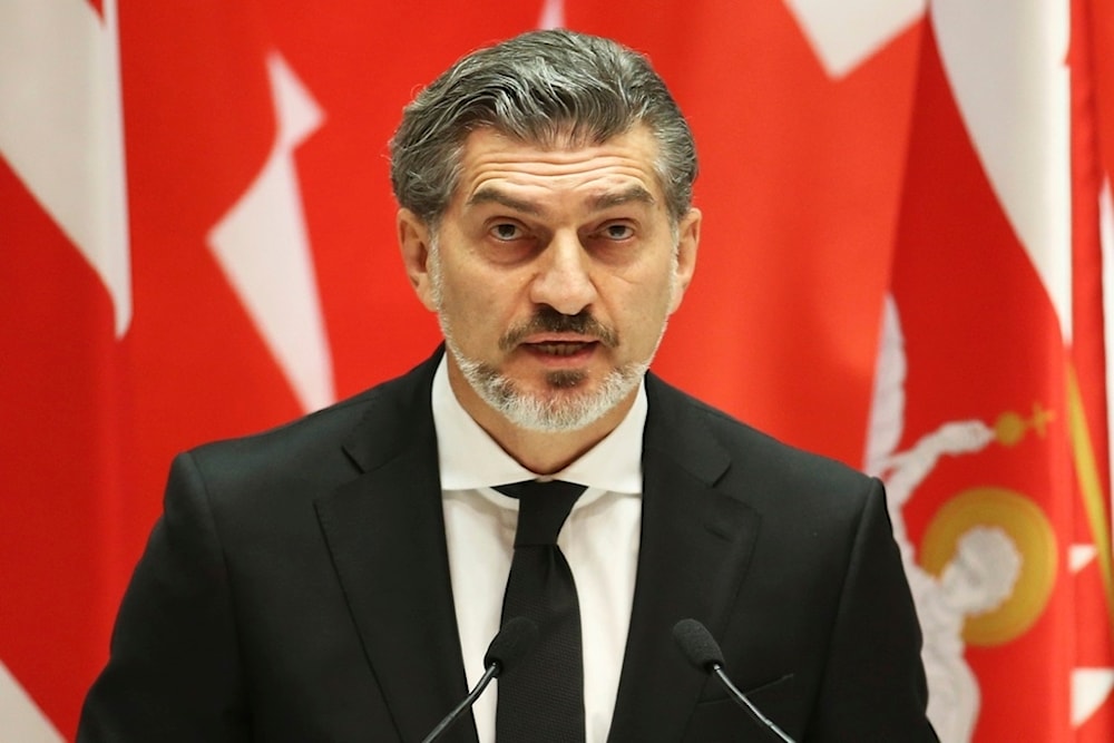 Georgian President-elect Mikheil Kavelashvili speaks at his swearing-in ceremony at the Georgian Parliament in Tbilisi, Georgia, Sunday, Dec. 29, 2024. (Irakli Gedenidze/Pool Photo via AP)