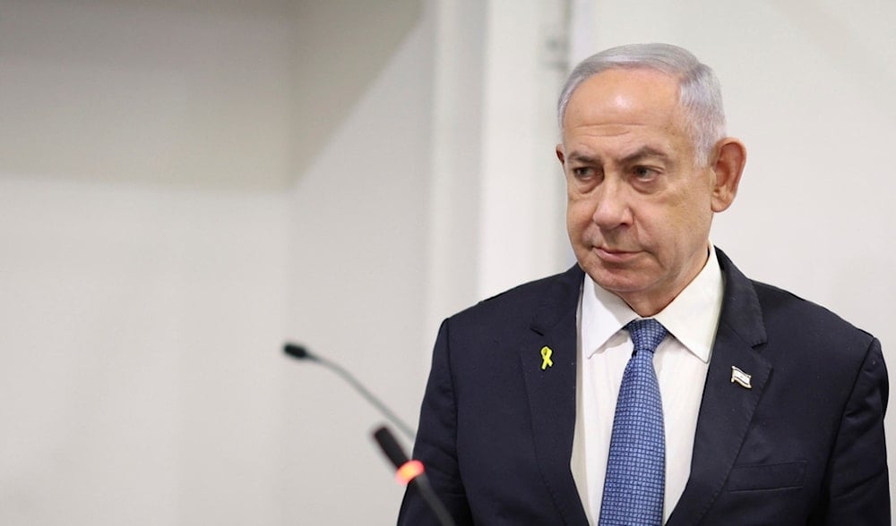 Israeli Prime Minister Benjamin Netanyahu attends his trial on corruption charges at the district court in Tel Aviv, occupied Palestine, Monday, Dec. 16, 2024. (AP)