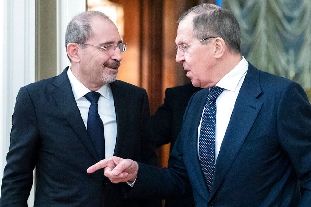 Russian Foreign Minister Sergey Lavrov, right, and Jordanian counterpart Ayman Safadi enter the hall during their meeting in Moscow, Russia, Wednesday, Feb. 19, 2020. (AP)