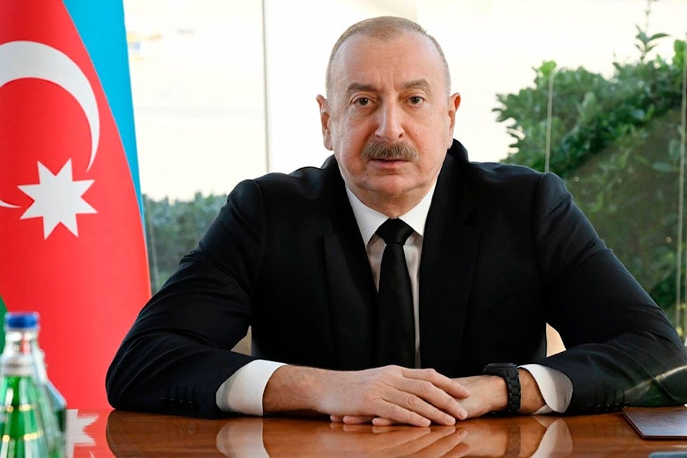 In this photo provided by Azerbaijan's Presidential Press Office, Azerbaijani President Ilham Aliyev holds a meeting in Baku, Wednesday, Dec. 25, 2024. (AP)