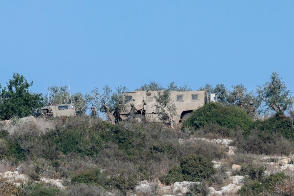 Israeli soldiers deploy during an operation near the southern West Bank village of Sir, south of Jenin, on December 1, 2024 (AFP)