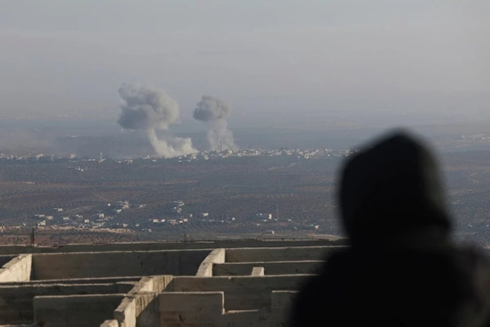 Smoke rises amid fighting between opposition factions and Syrian goverment troops in Idlib, Syria on November 28,2024. (AP)