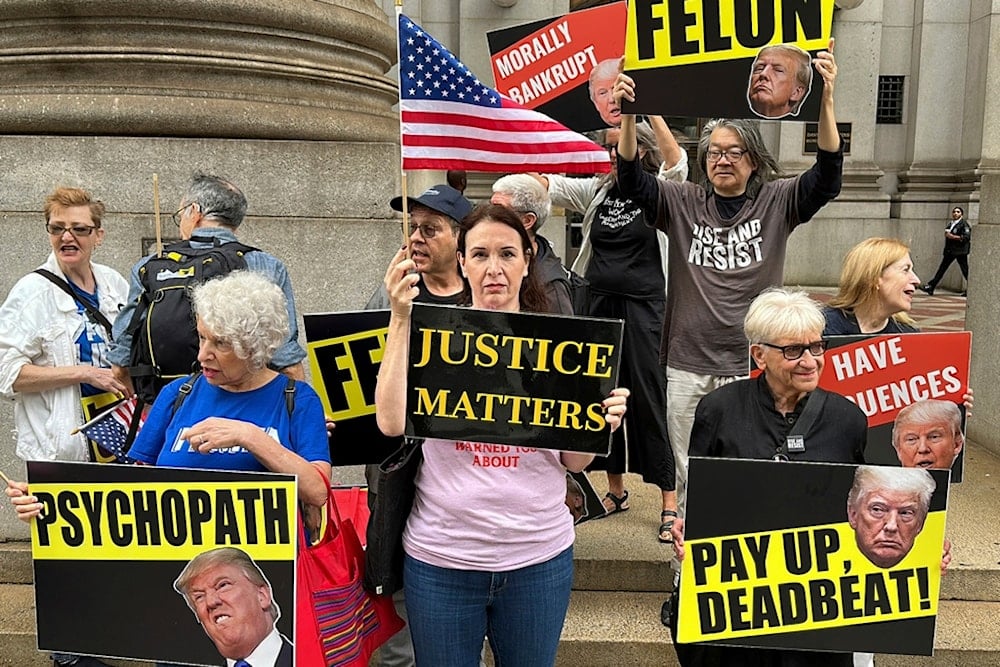 People protesting against Donald Trump are outside a Manhattan federal appeals court in New York on Friday, September 6, 2024. (AP)