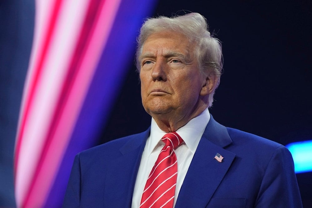 President-elect Donald Trump speaks at AmericaFest, Sunday, Dec. 22, 2024, in Phoenix. (AP Photo/Rick Scuteri)