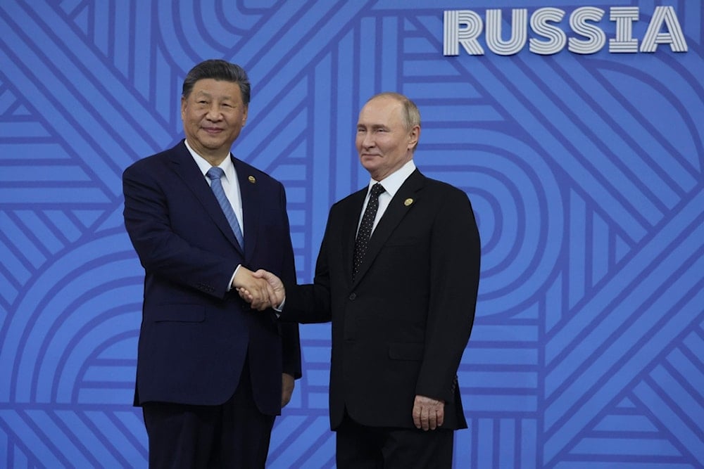 Xi promises 'world peace' in New Year's message to Putin