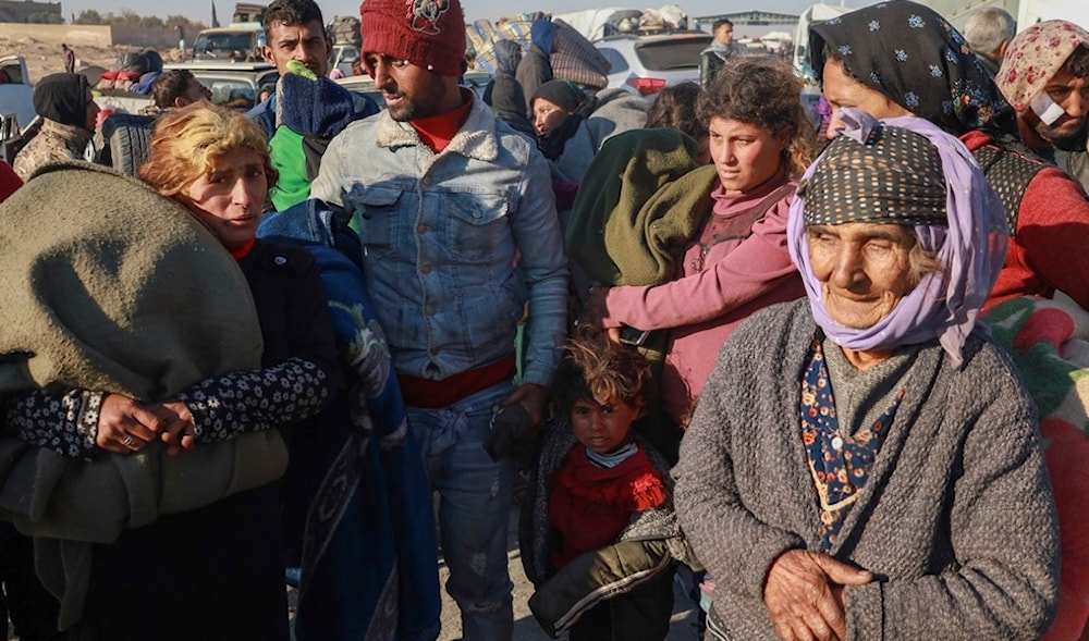 Kurdish people displaced from the Aleppo region arrive to Kurdish controlled areas in Raqqa, Syria, Tuesday Dec. 3, 2024. (AP)