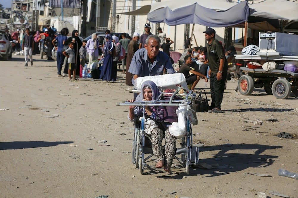 WHO estimates that one in four people  sustained life-changing injuries & will need rehabilitation services, including care for amputations & spinal cords injuries.  A Palestinain man pulls a women injured during the Israeli war on Gaza. (UNRWA)