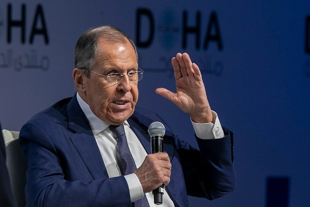 Russian Foreign Minister Sergey Lavrov gestures as he speaks at the Doha Forum in Doha, Qatar, on December 7, 2024. (AP)