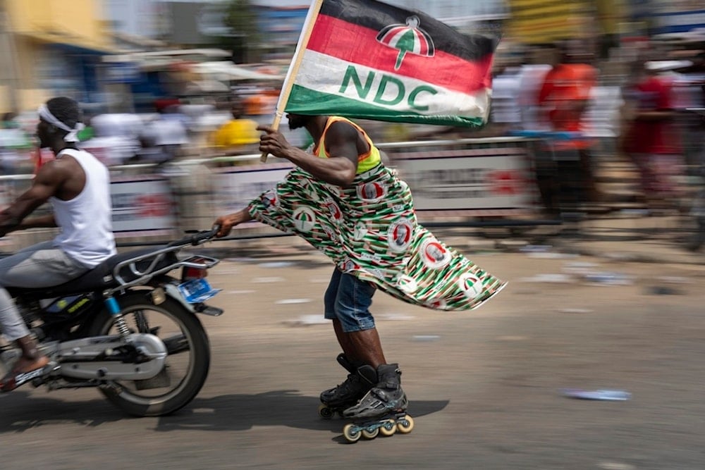 Supporters of opposition candidate and former President John Dramani Mahama celebrate his victory after his opponent conceded in Accra, Ghana, Sunday, Dec. 8, 2024. (AP)