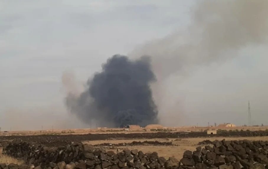 A picture showing violent explosions at the Khalkhala military airbase in southern Syria (Twitter)).