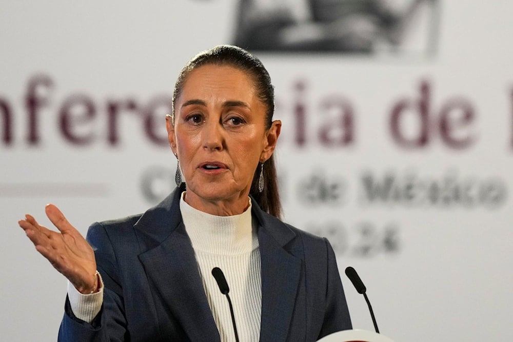 Mexican President Claudia Sheinbaum gives a media briefing from the National Palace in Mexico City, on October 2, 2024. (AP)