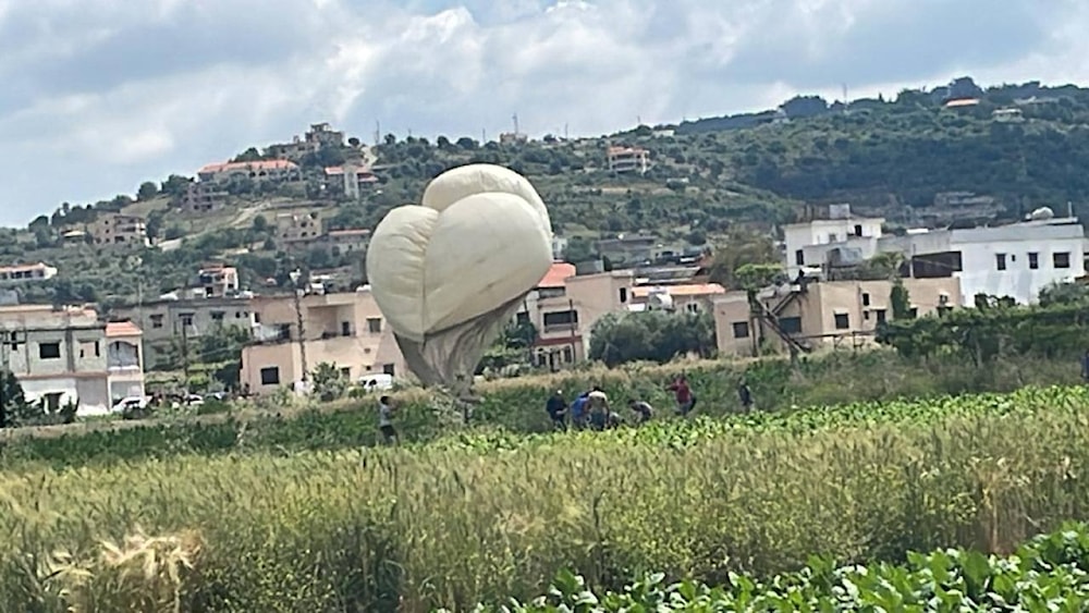 The Israeli spy balloon targeted and dropped by Hezbollah fighters in the south of Lebanon, May 14, 2024 (Social Media)