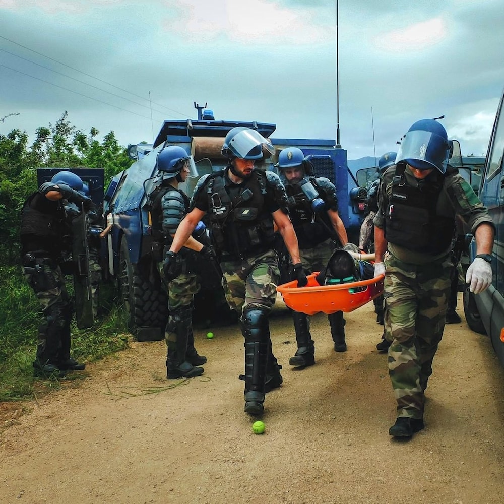 Law enforcers are transporting the body of a constable who got injured during the protests. (Social Media)