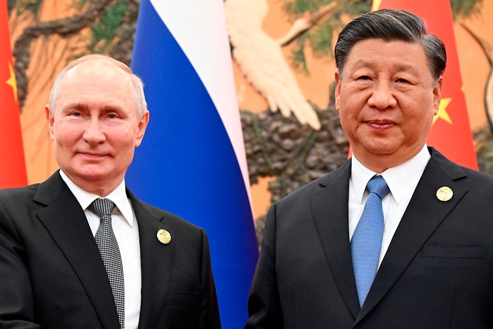 Chinese President Xi Jinping and Russian President Vladimir Putin pose for a photo before their talks on the sidelines of the Belt and Road Forum in Beijing, China, on Wednesday, Oct. 18, 2023. (AP)