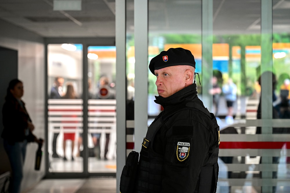 A policeman monitors the entrance of the F. D. Roosevelt University Hospital, where Slovak Prime Minister Robert Fico, who was shot and injured, is treated in Banska Bystrica, central Slovakia, Wednesday, May 15, 2024. (AP)