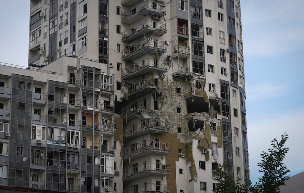 An apartment building damaged in Kharkiv, Tuesday, May 14, 2024. (AP Photo/Andrii Marienko)