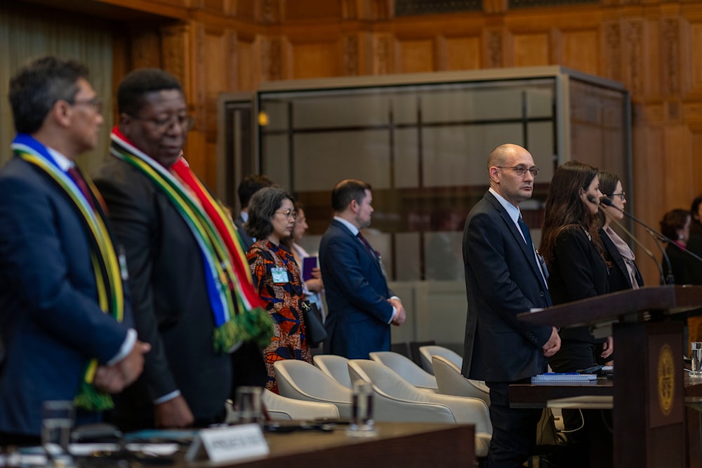 South Africa's and 'Israel's' lawyers wait for the start of hearings at the International Court of Justice, in The Hague, Netherlands, on Thursday, May 16, 2024.(AP)