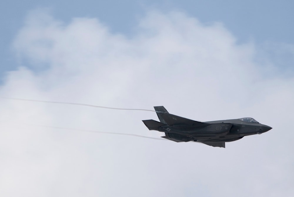 An F-35 Lightning conducts a fly-by at the Dubai Air Show in Dubai, United Arab Emirates, Thursday, Nov. 16, 2023. (AP Photo/Jon Gambrell)